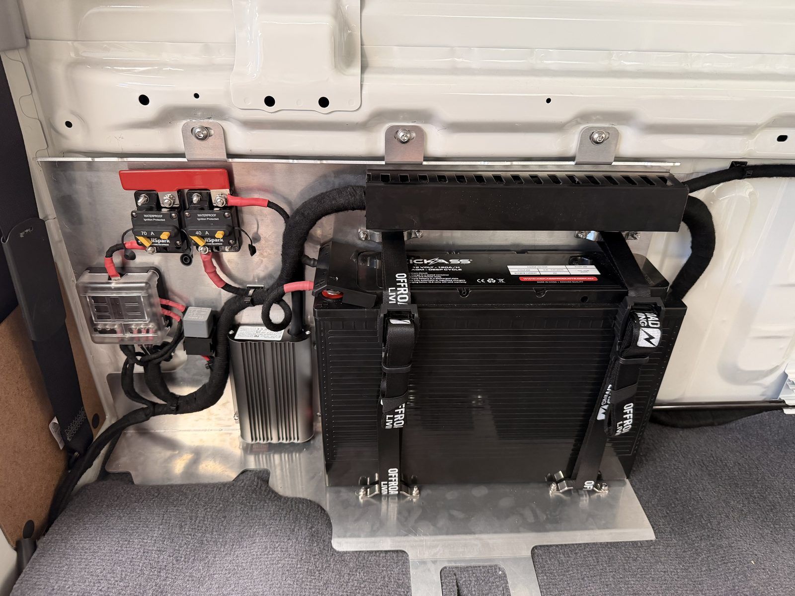 Auxiliary battery, DC-DC charger and circuit breaker panel in a LandCruiser